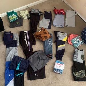 Size 10/12 sets and 4 pair of gym shorts. 26 items